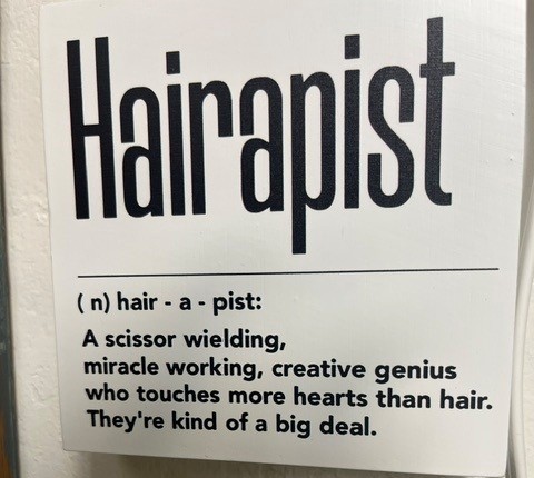 Hairapist print on the wall